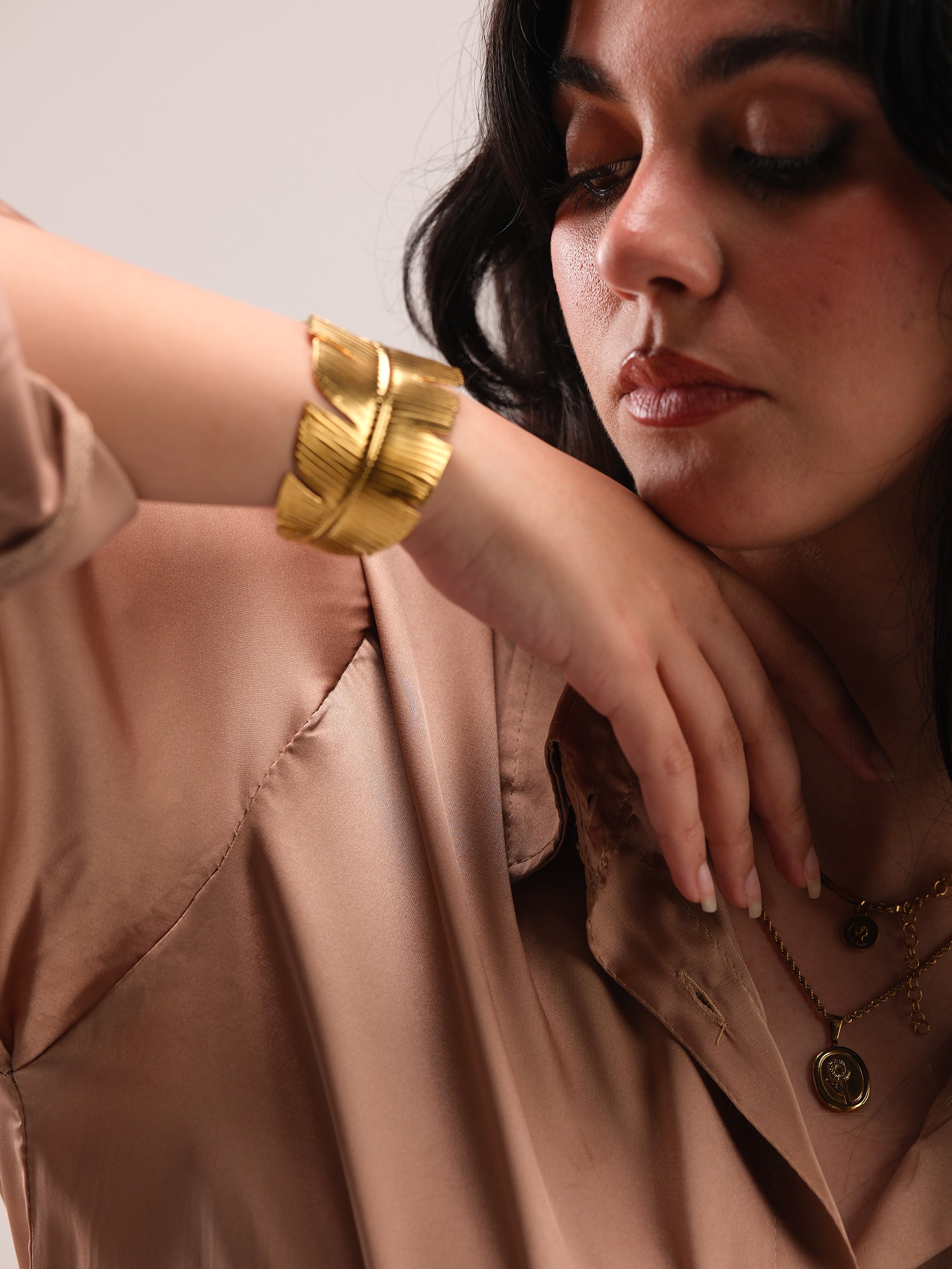 feather gold bracelet