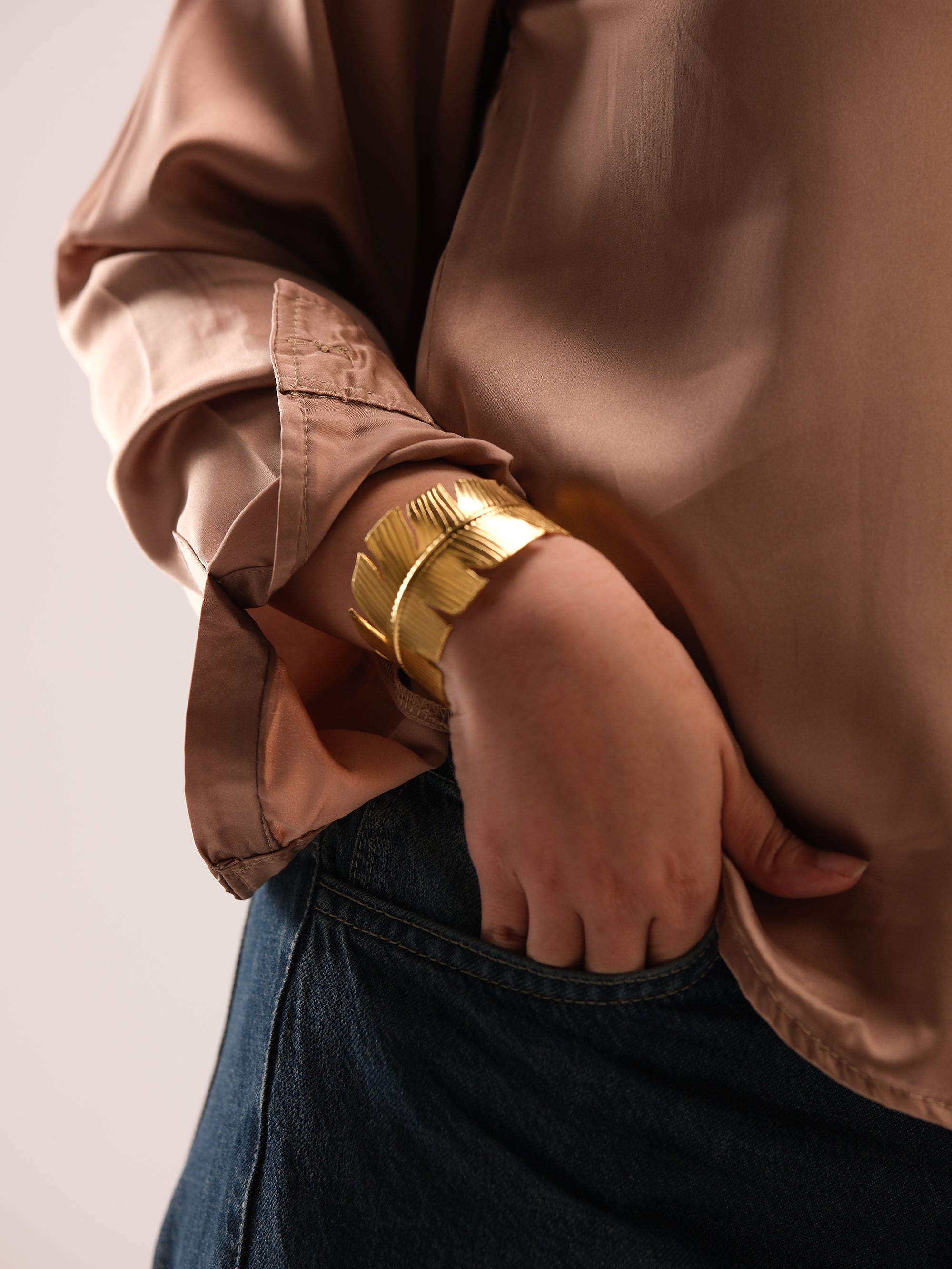 feather gold bracelet