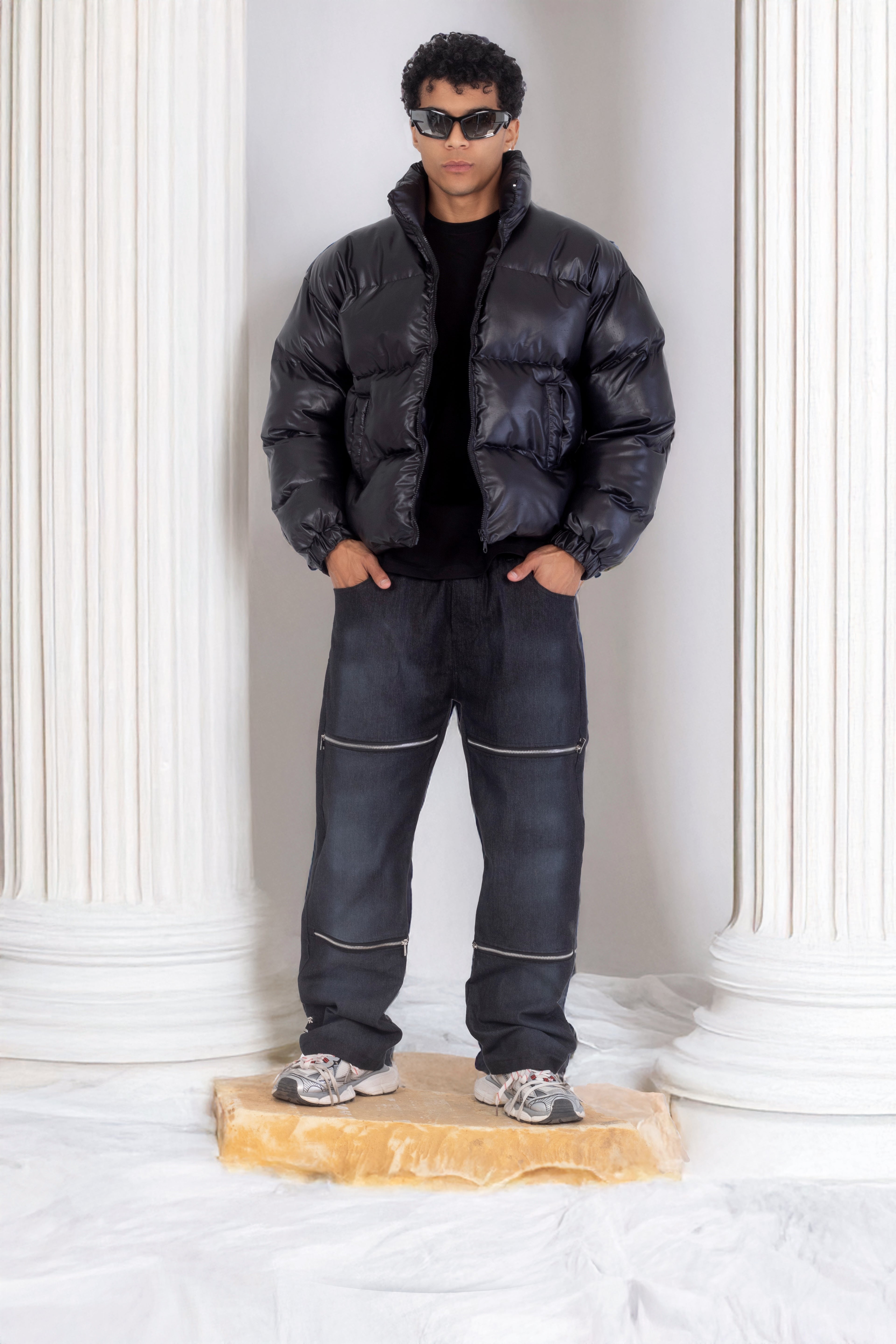 Leather effect puffer jacket in black