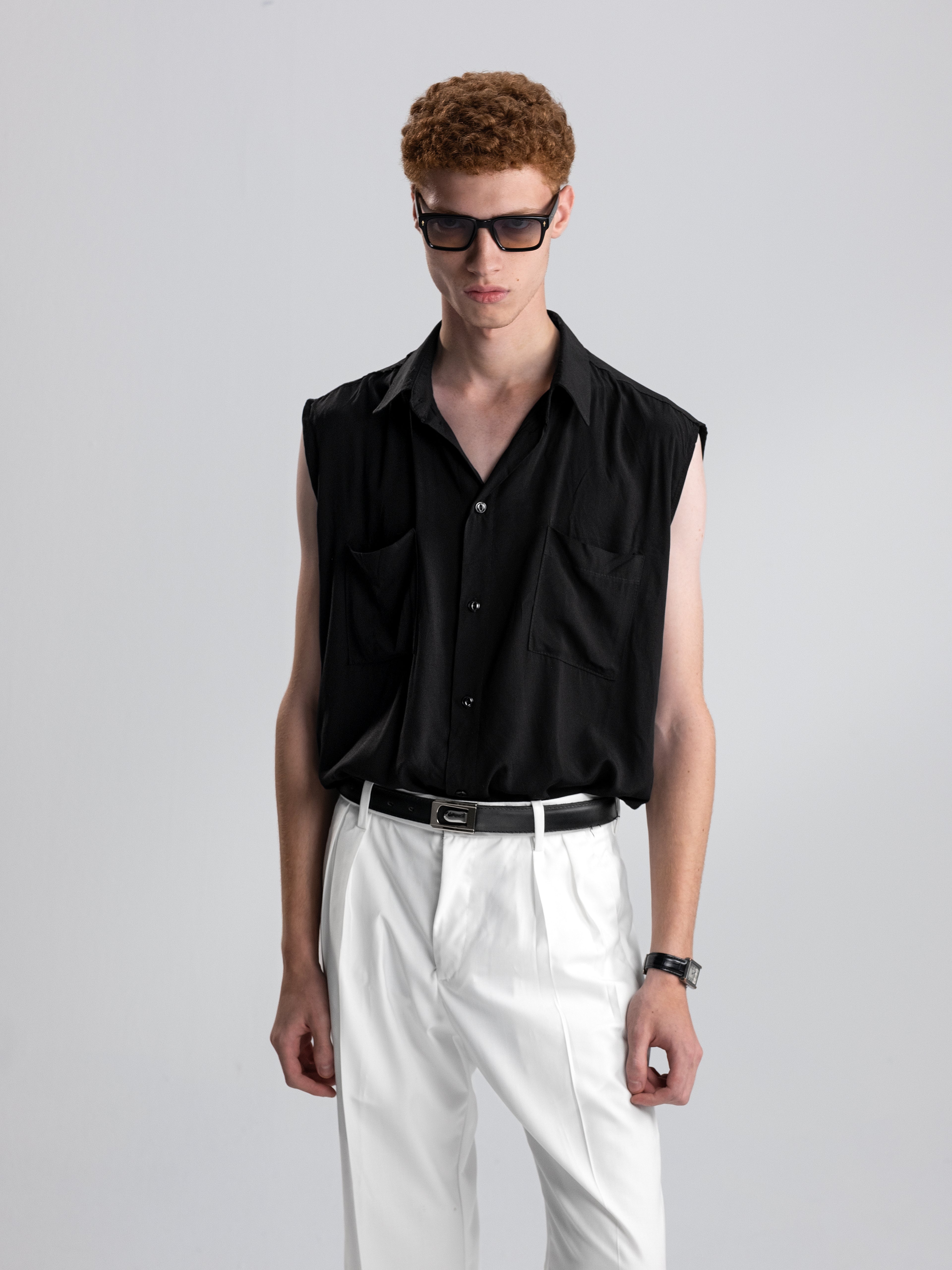 RELAXED SLEEVELESS BLACK SHIRT