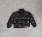 Leather effect puffer jacket in black